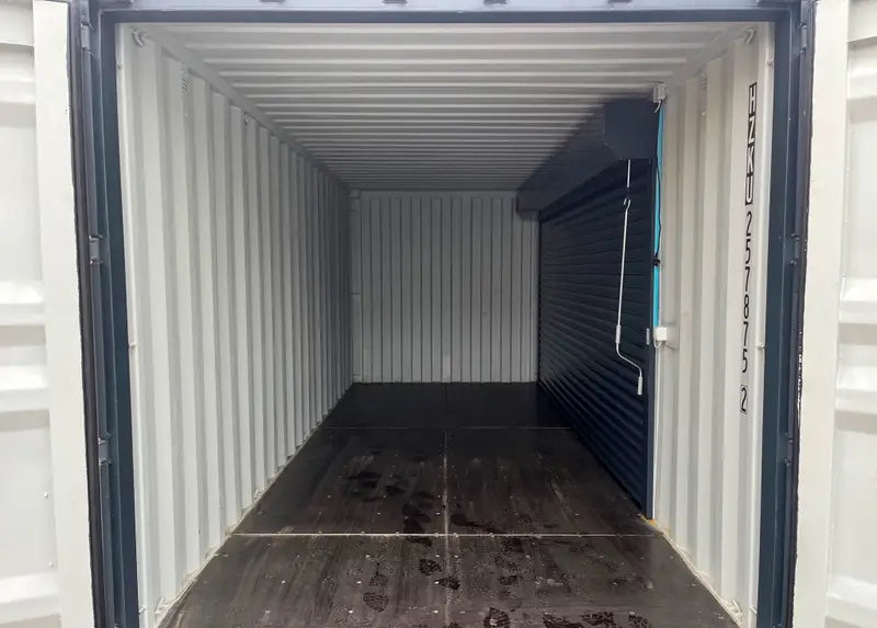 20-Fuß-Container mit Rolltoren und Eingangstür RAL 7016-C