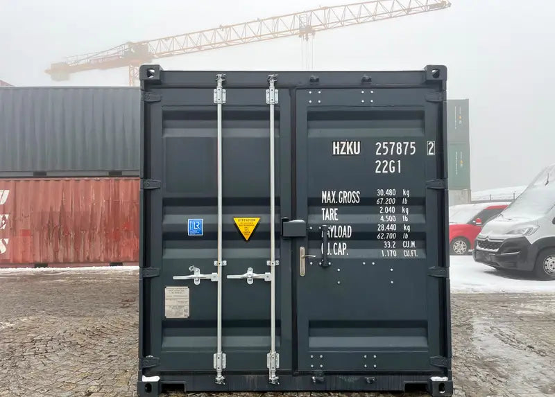 20-Fuß-Container mit Rolltoren und Eingangstür RAL 7016-C