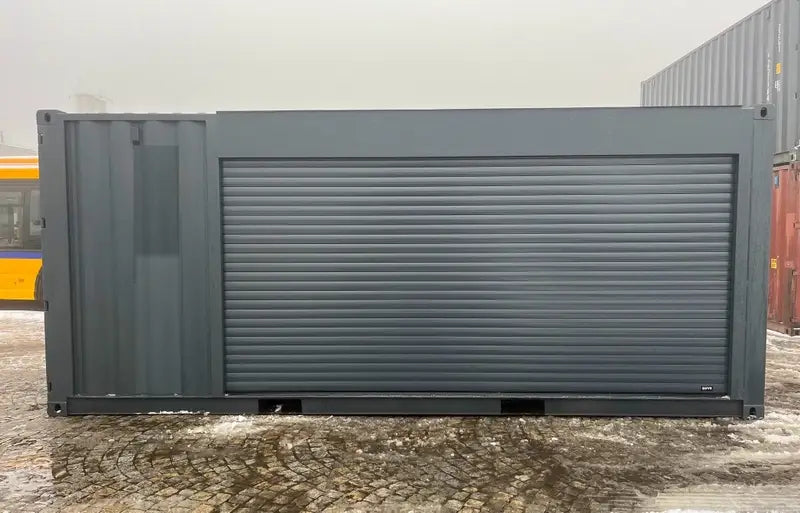 20-Fuß-Container mit Rolltoren und Eingangstür RAL 7016-C
